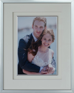 Wedding photo with contemporary silver frame and silver fillet