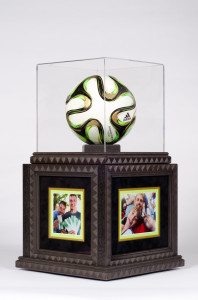 World Cup soccer ball on rotating photographs