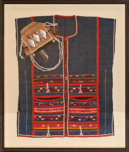 Traditional Nepalese clothing in shadow box