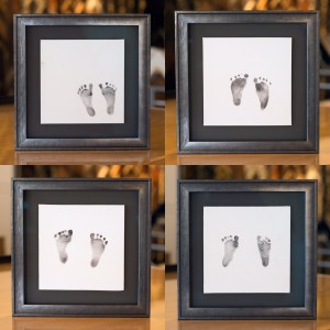 Four sets of infant footprints, floated in individual frames