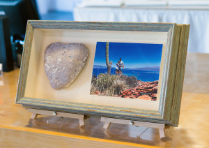 Vacation photograph with heart shape rock in custom frame